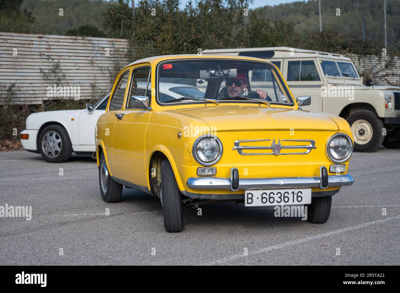 Front view of a small classic Spanish economy car, the Seat 850 in