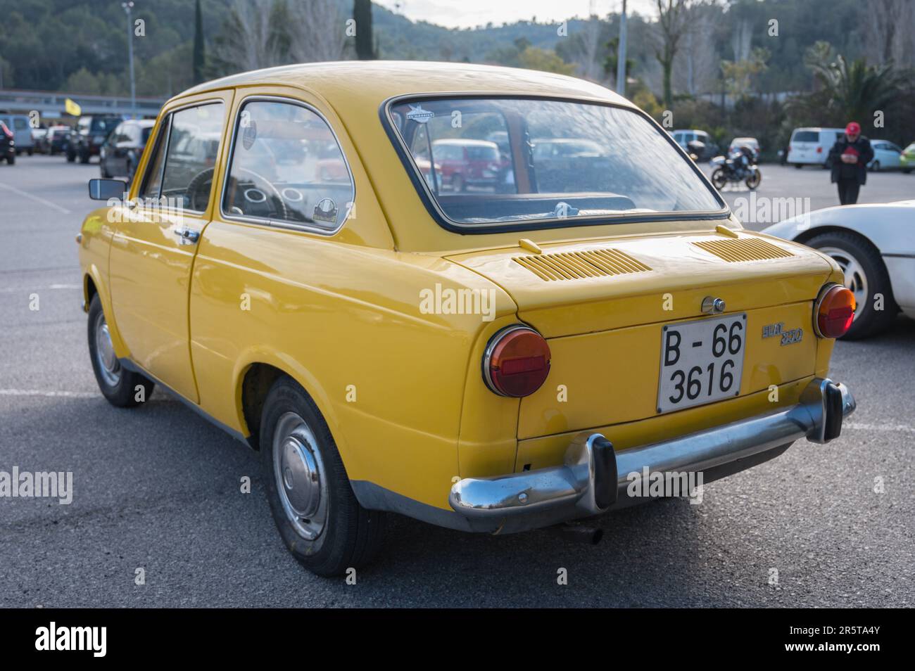 Rear view of a small classic Spanish economy car, the Seat 850 in ...