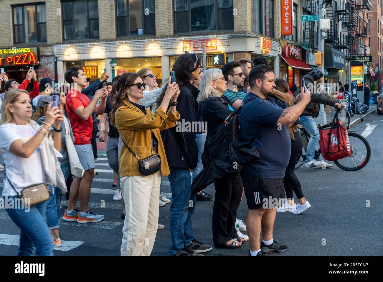Astronomy Lovers Risk Life And Limb As They Stand In West 23rd Street astronomy-lovers-risk-life-and-limb-as-they-stand-in-west-23rd-street