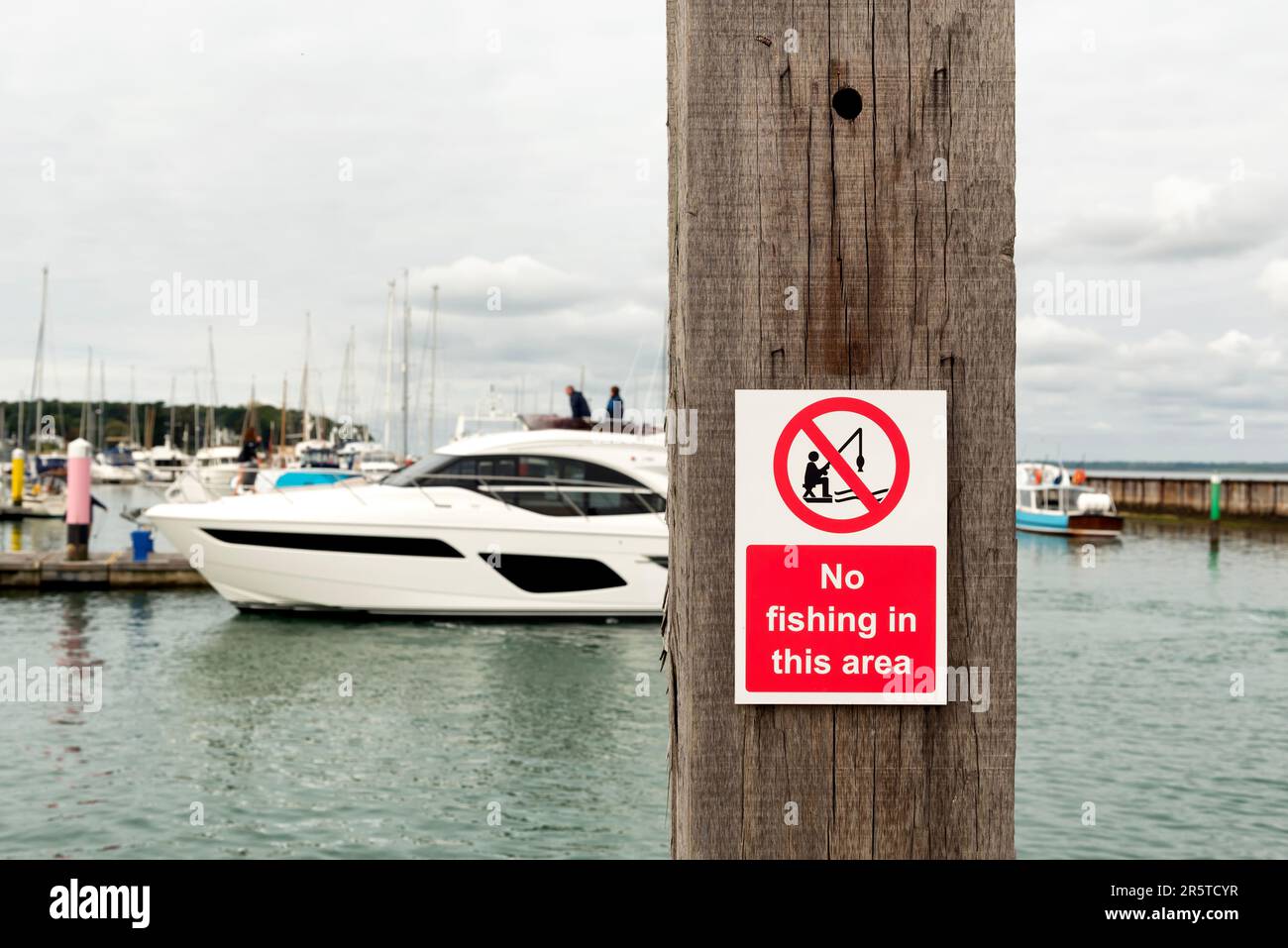 No fishing sign with the marina in the background Stock Photo
