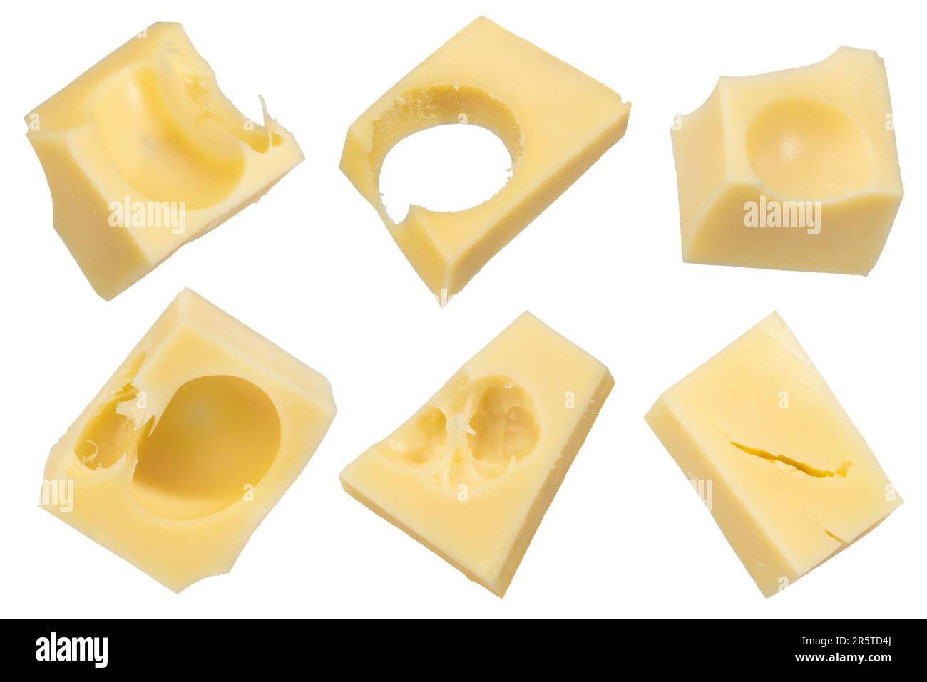 Pieces of emmental cheese on a white isolated background. Pieces