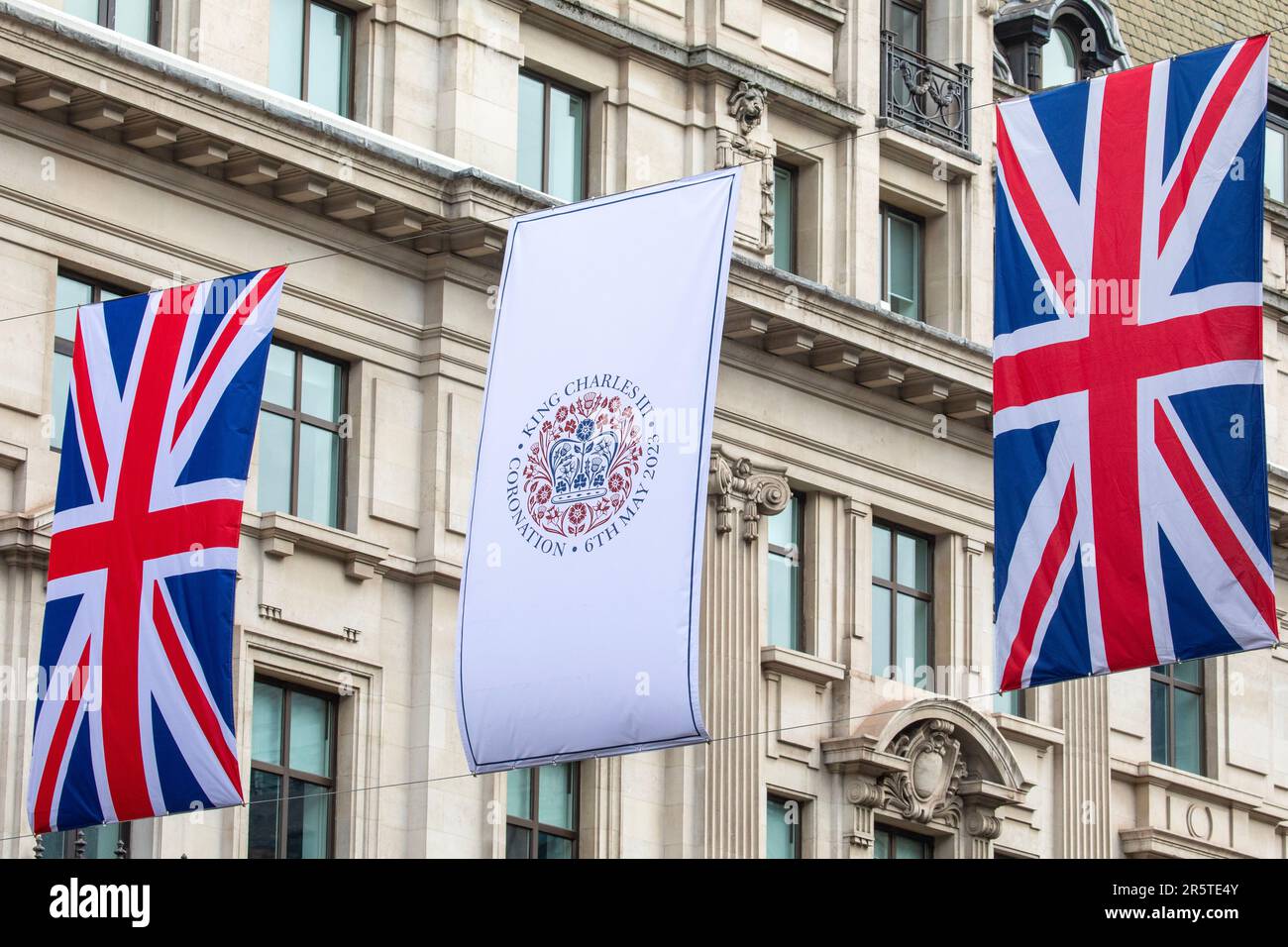 London, UK - April 30th 2023: Union Flags and Banners on Regent Street in London, commemorating the upcoming Coronation of King Charles III. Stock Photo