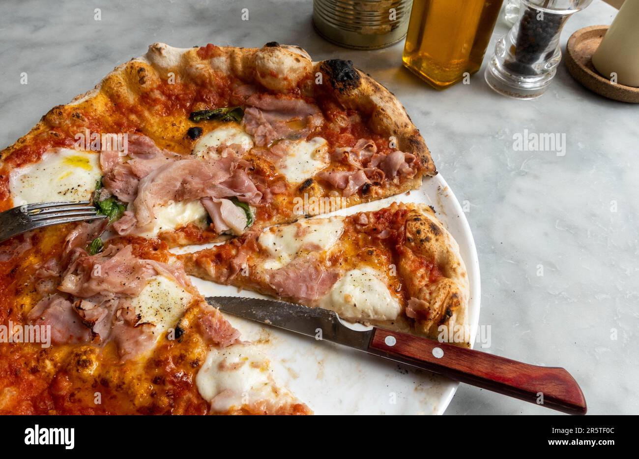 Pizza with ham Stock Photo