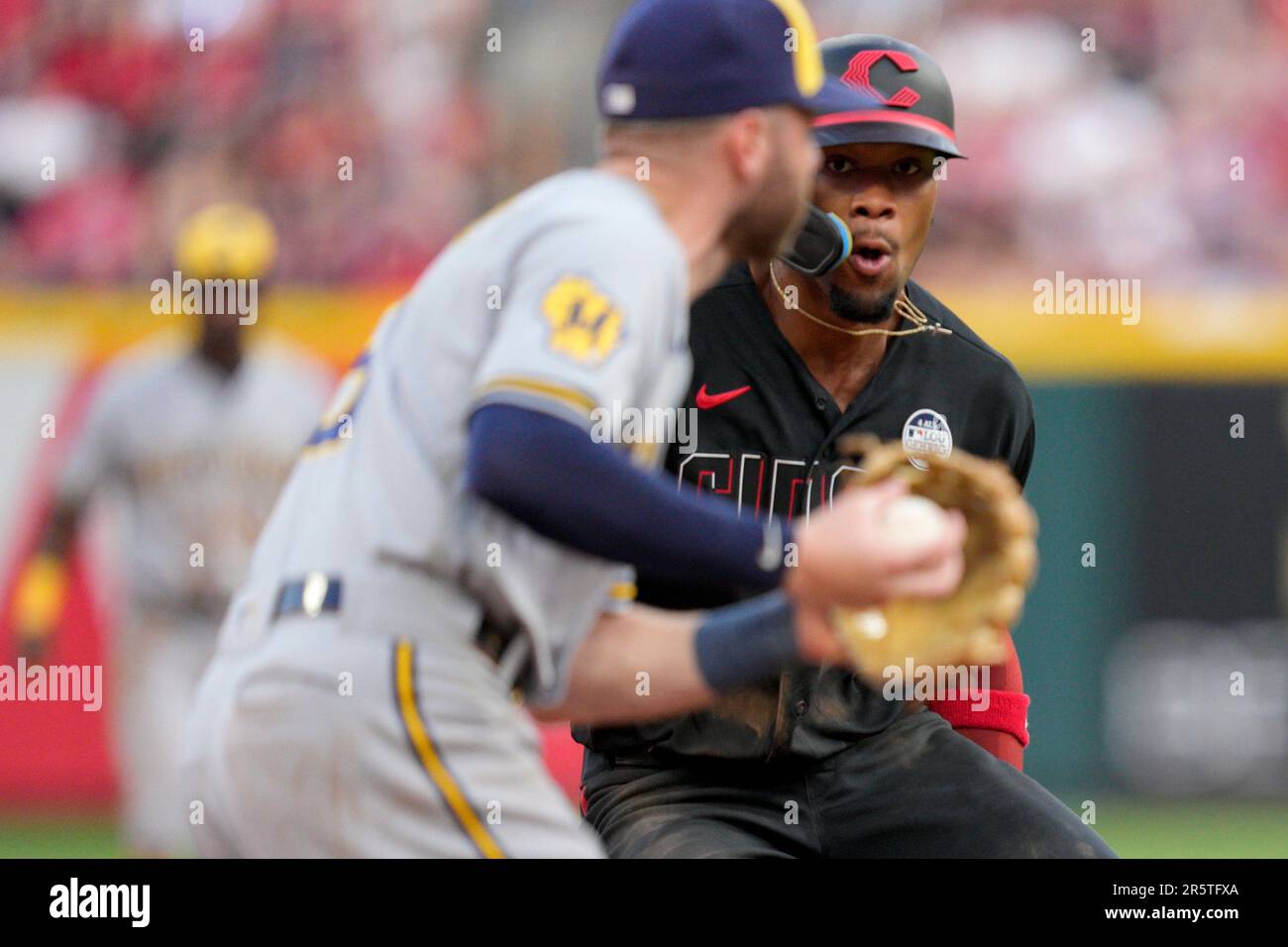 Cincinnati Reds' Will Benson, right, runs the bases during a baseball