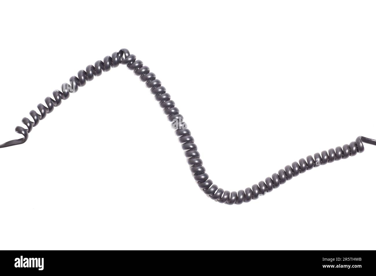 Twisted black telephone cord isolated on white background Stock Photo
