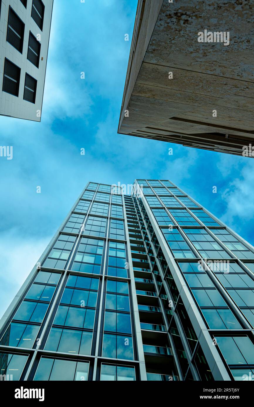 A modern skyscraper with a contemporary glass facade Stock Photo - Alamy