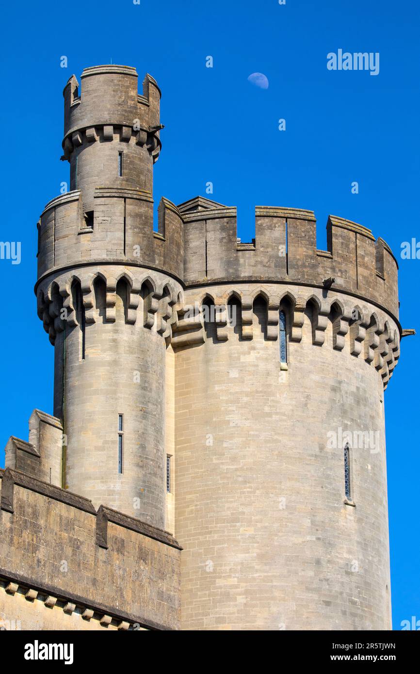 Sussex, UK - April 29th 2023: The moon rising above the historic Arundel Castle in Arundel, West Sussex. Stock Photo