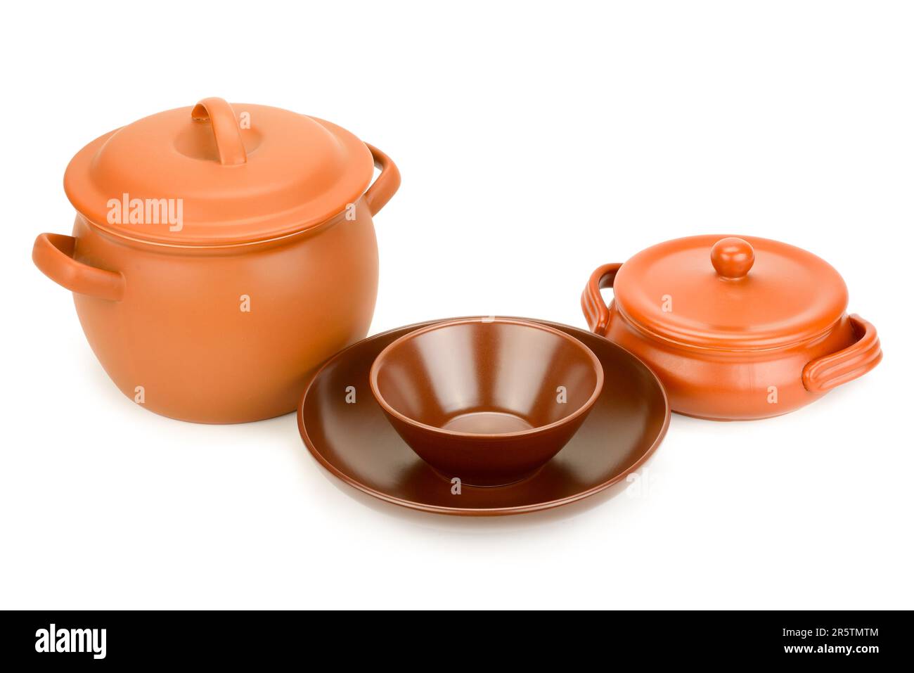 Heatresistant ceramic dishes isolated on white background. Side view Stock Photo Alamy