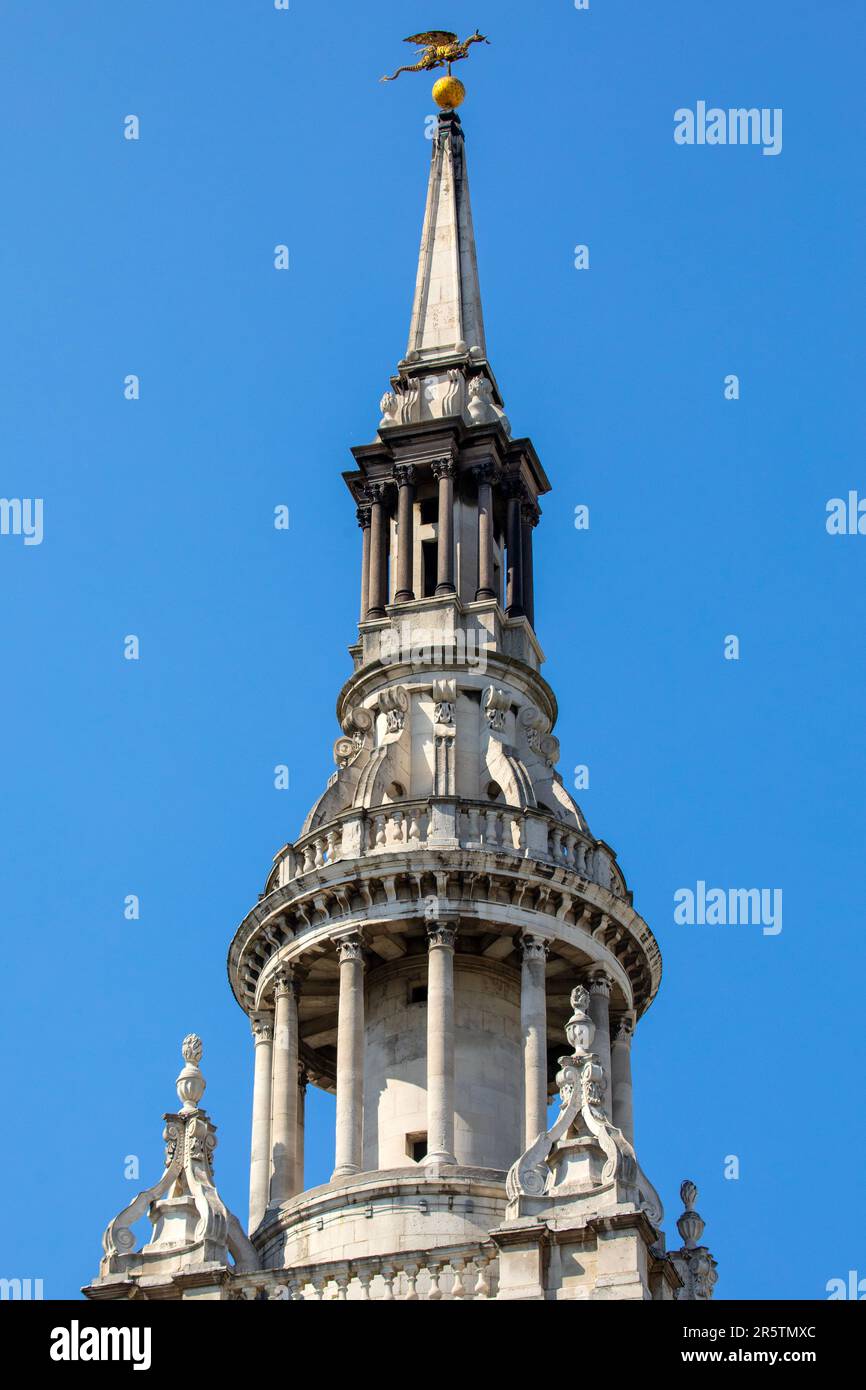 The magnificent spire of St. Mary-le-Bow church, topped with a gold Dragon sculpture, in the City of London, UK. Stock Photo