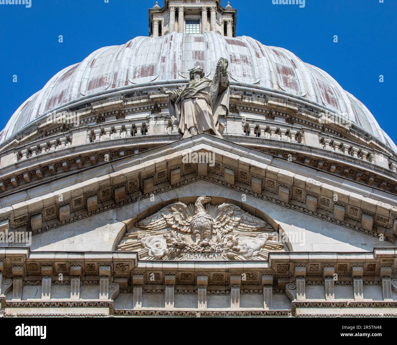 Stone relief carving of a Phoenix on the exterior of St. Pauls