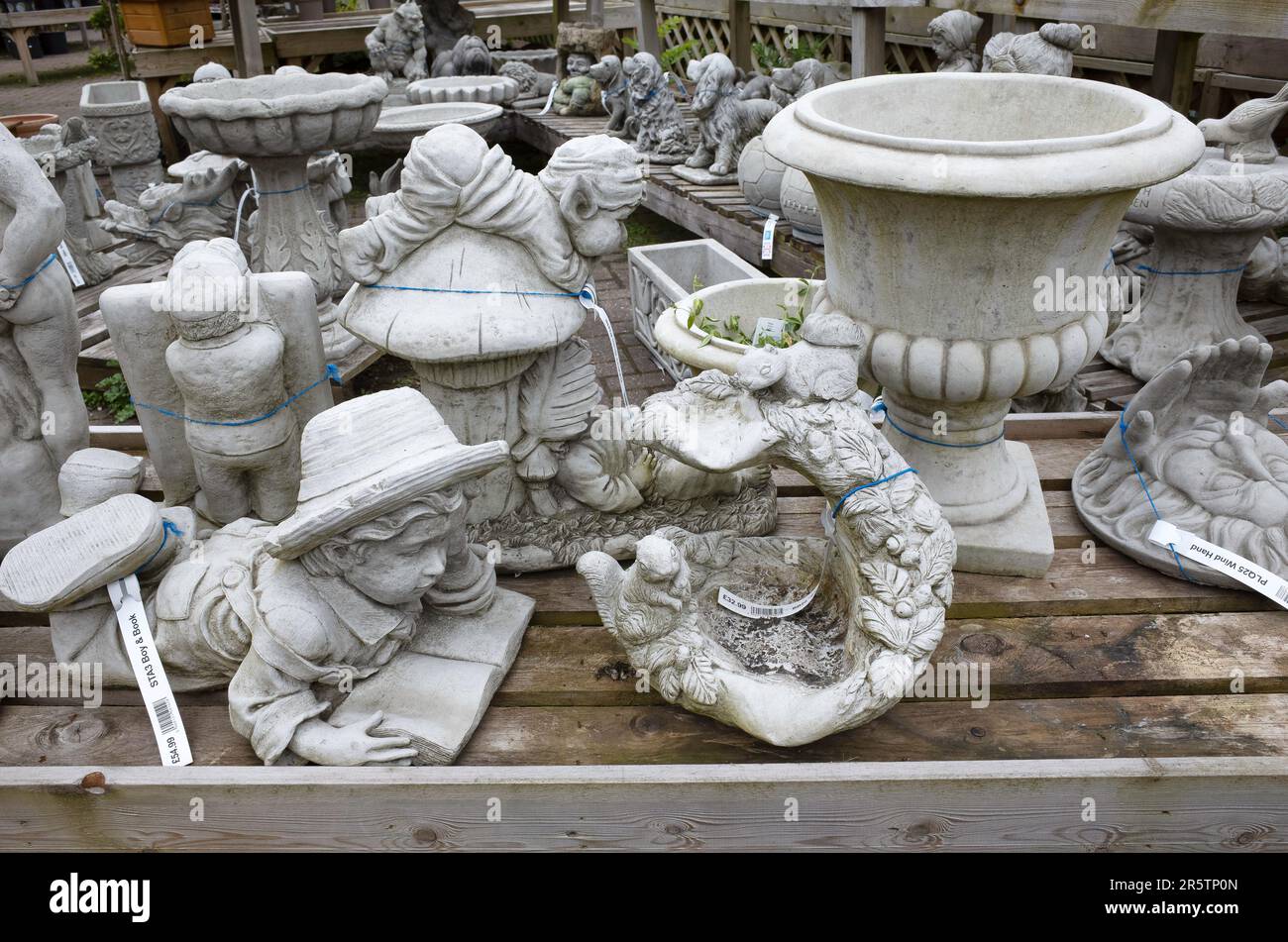 A collection of garden ornament statues for sale in a Garden Centre