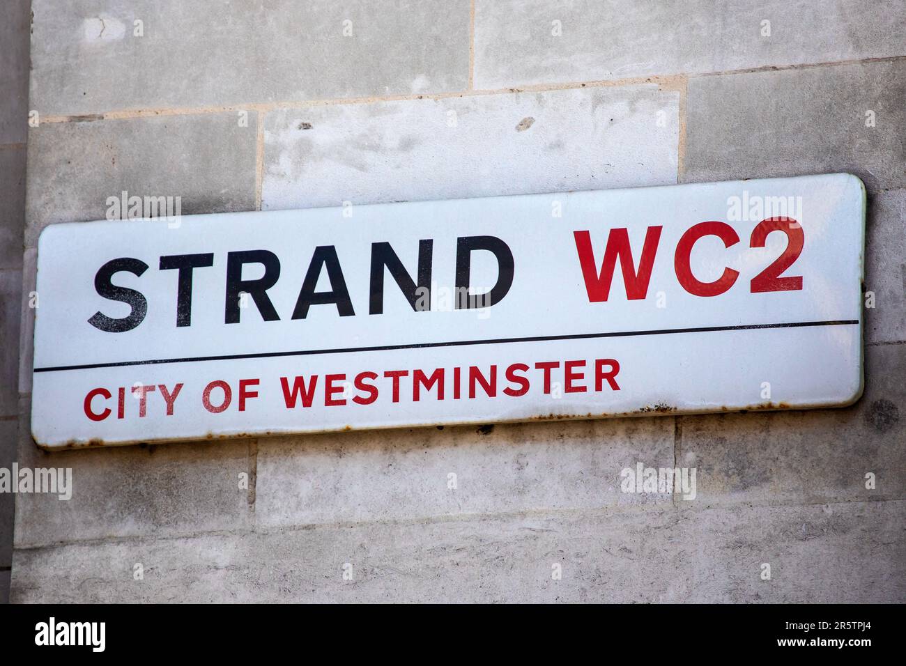 London, UK - April 20th 2023: Street sign for the Strand in the City of Westminster in London, UK. Stock Photo
