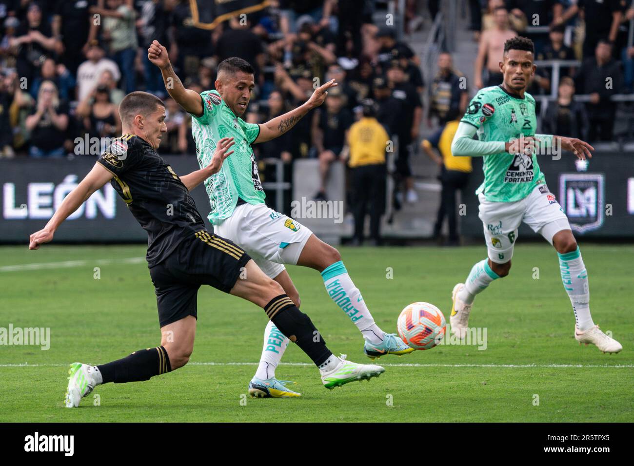 LAFC defender Sergi Palencia (30) is defended by Club León midfielder Elias Hernandez (11) during the 2023 Concacaf Champions League final match, Sund Stock Photo