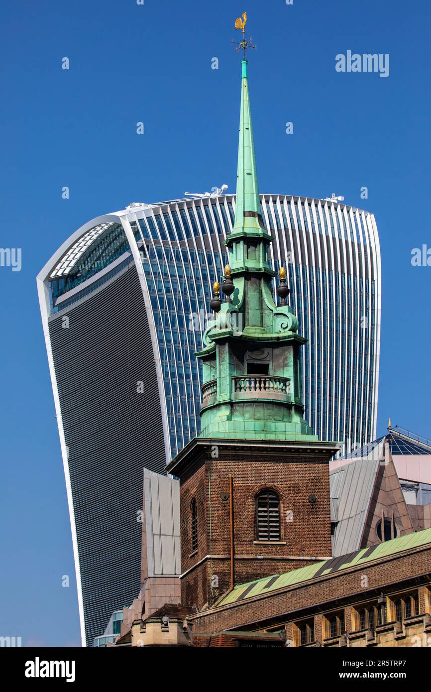 View of the historic All Hallows by the Tower church, located on Byward Street in London, UK.  The modern 20 Fenchurch Street skyscraper is behind. Stock Photo