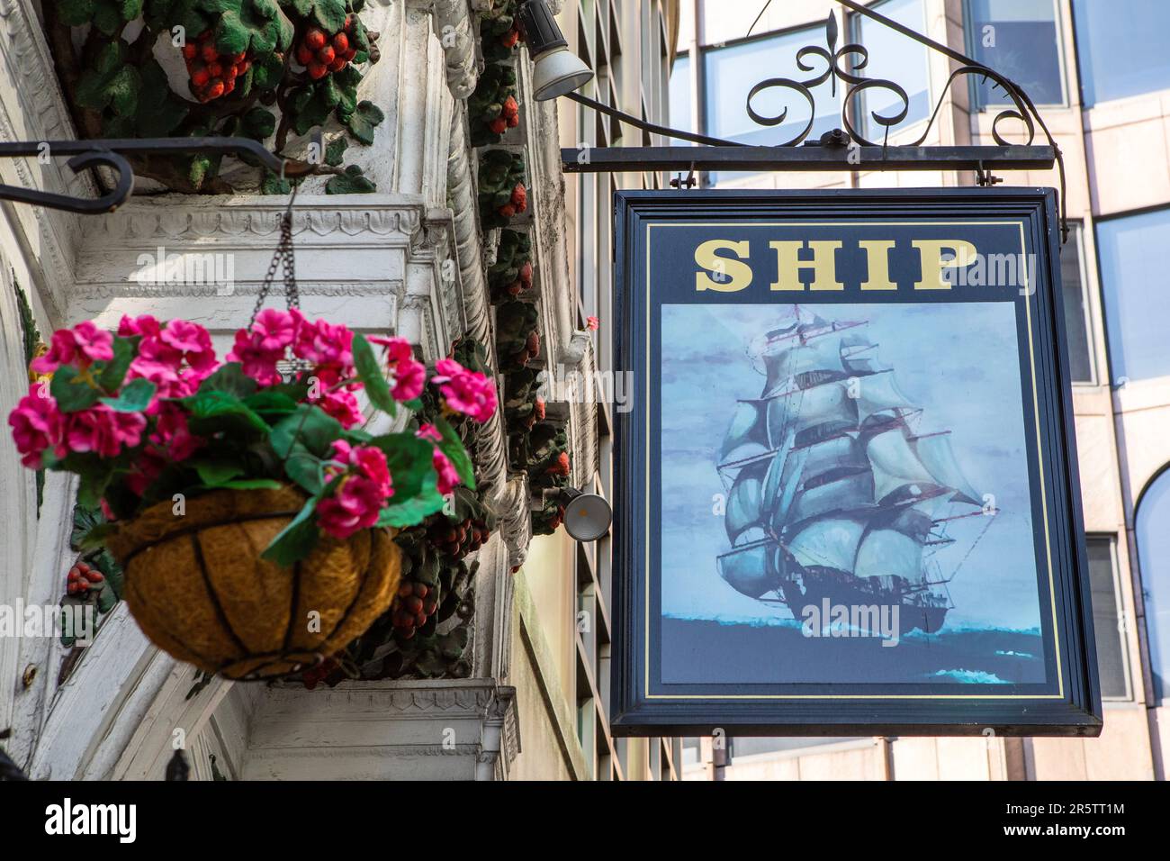 London, UK - April 17th 2023: The vintage signboard on the exterior of The Ship public house, located on Hart Street in London, UK. Stock Photo