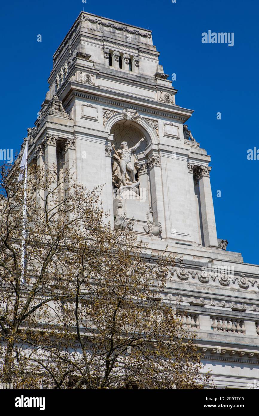 London, UK - April17th 2023: The statue of Old Father Thames on the facade of 10 Trinity Square in London, UK - the former headquarters of the Port of Stock Photo