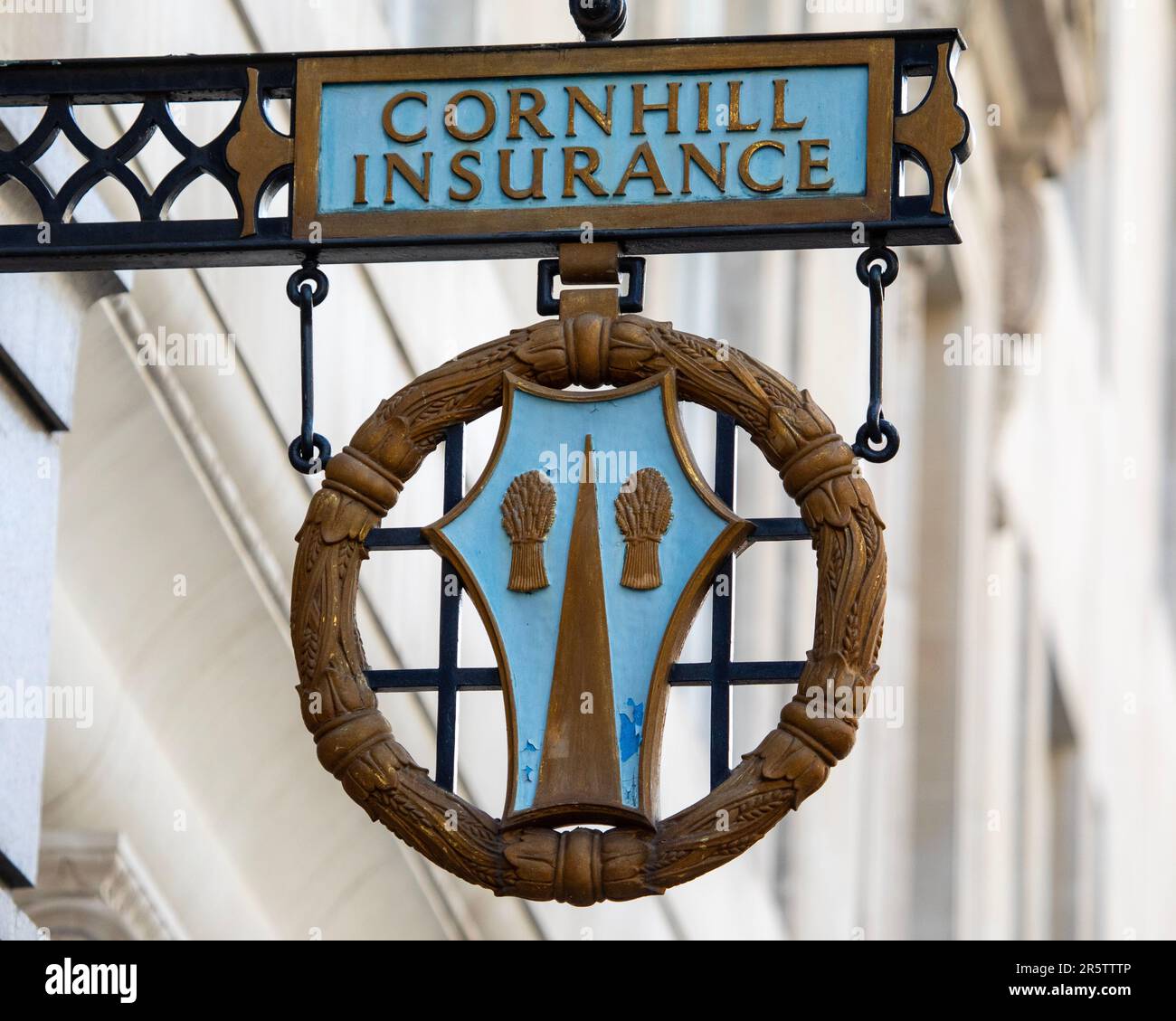 London, UK - April 17th 2023: A vintage Cornhill Insurance sign on the exterior of a building on Cornhill in the City of London, UK. Stock Photo