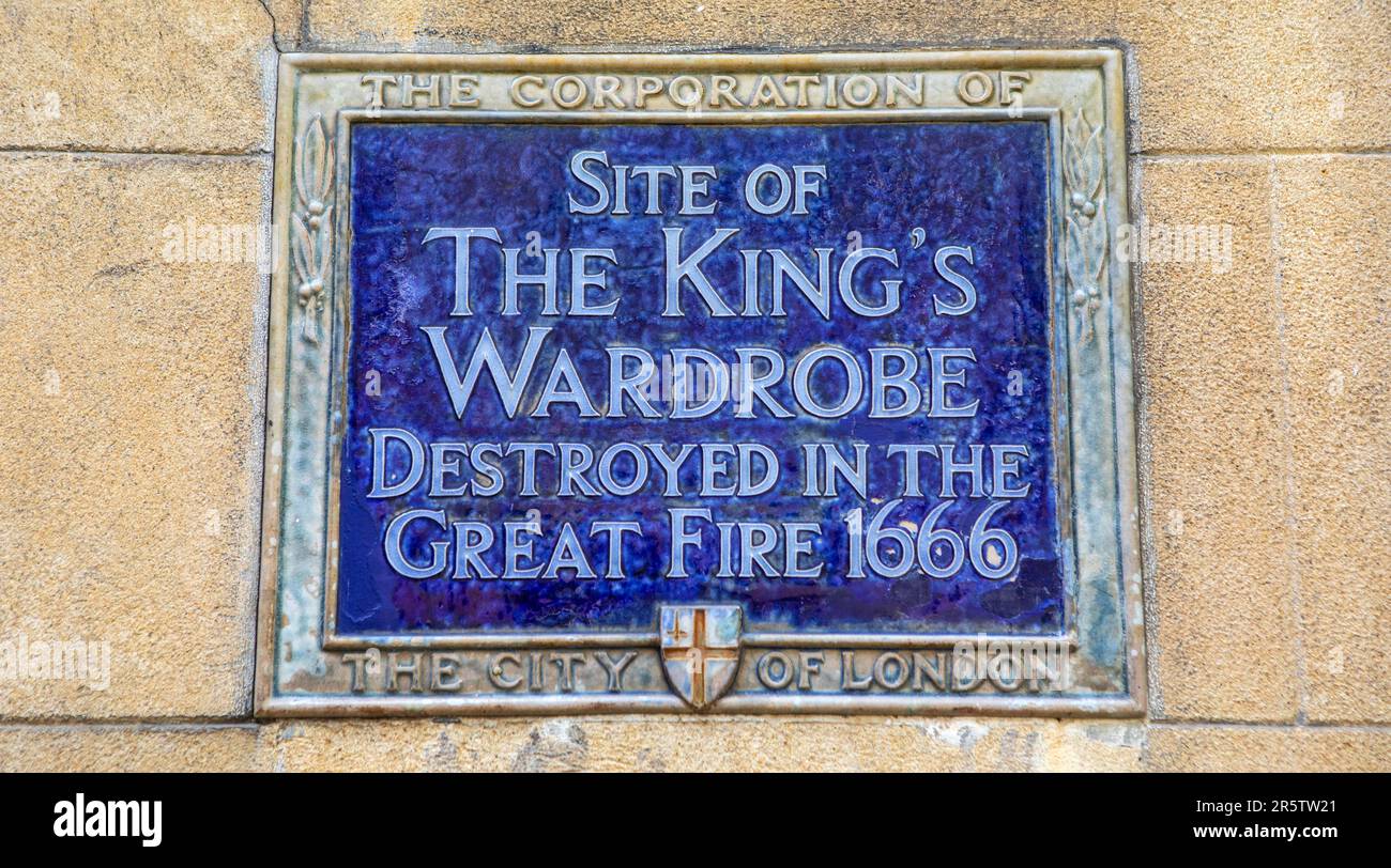 London, UK - April 17th 2023: Blue plaque located on Wardrobe Place in London, marking where the Kings Wardrobe was situated until it was destroyed in Stock Photo