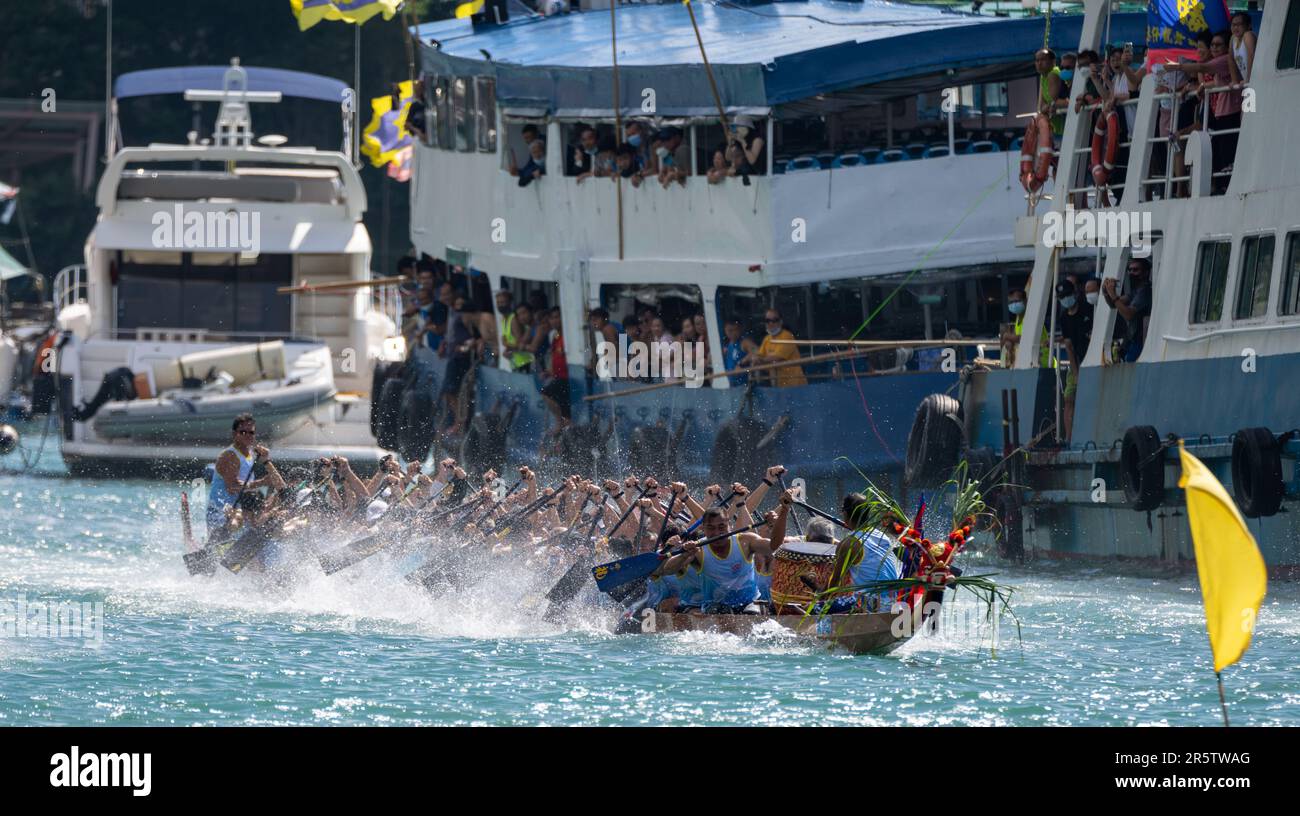 a close up of a rowing team working to finish the Aberdeen Boat Race
