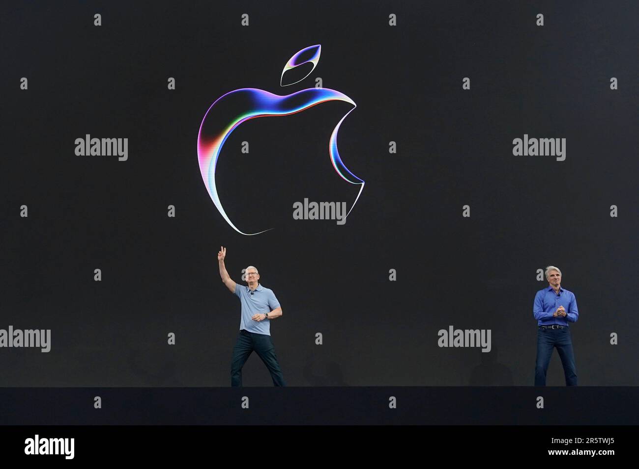 Apple CEO Tim Cook, left, joins Craig Federighi, Senior vice president