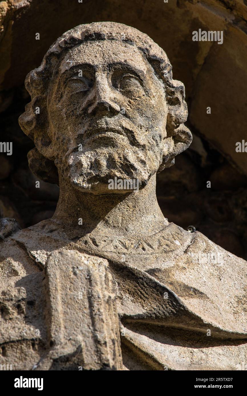 A sculpture of Robert Mantell - founder of Beeleigh Abbey, on the exterior of the historic All Saints Church in Maldon, Essex, UK. Stock Photo