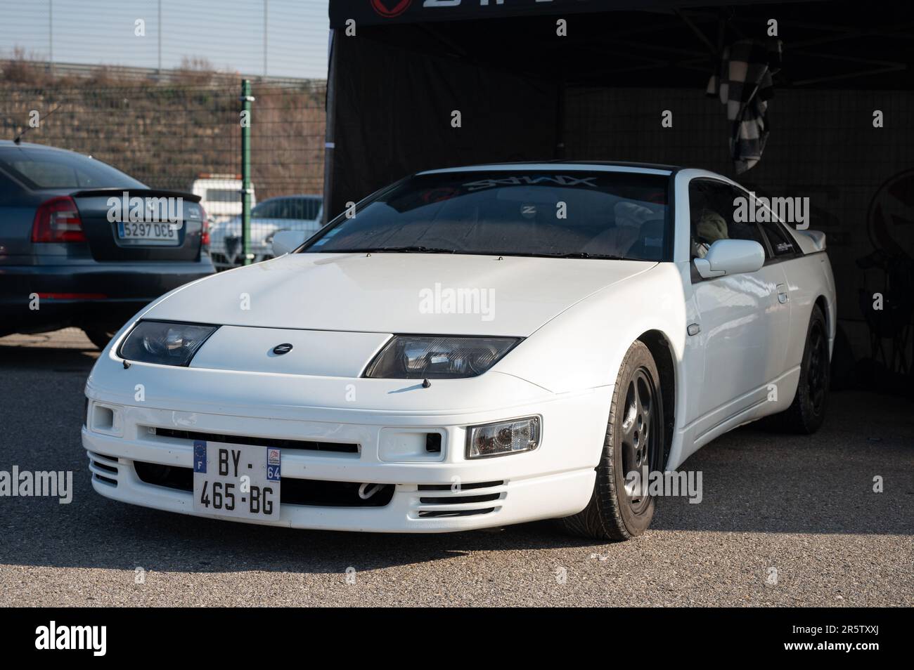 Detail of a beautiful classic Japanese sports car, the white Nissan 300ZX Z32 parked Stock Photo