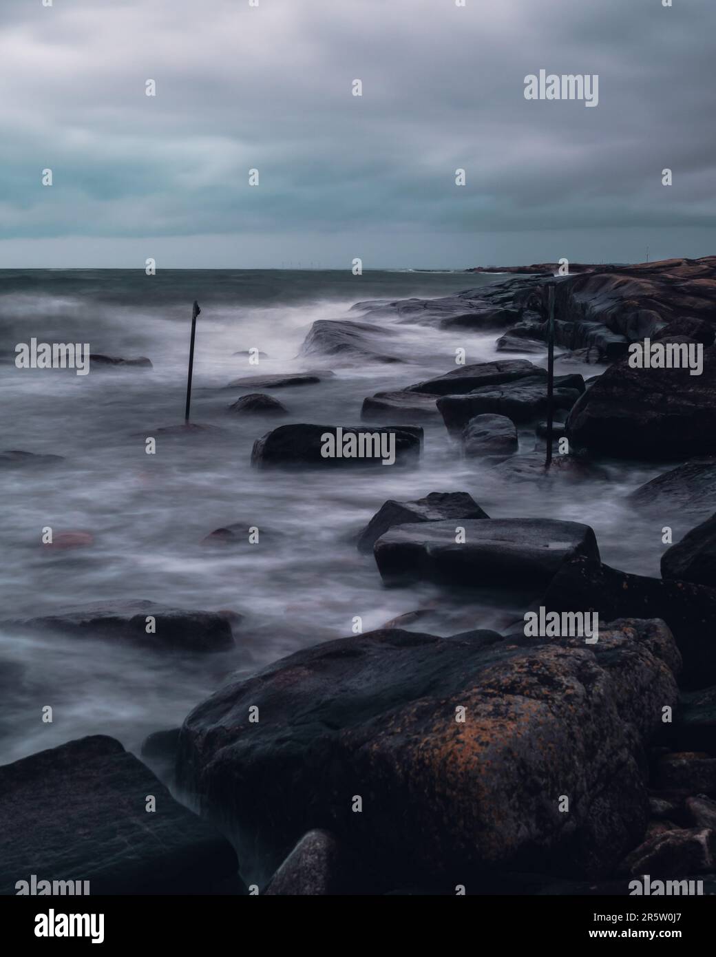 A stunning long exposure photograph of large granite rocks along the ...