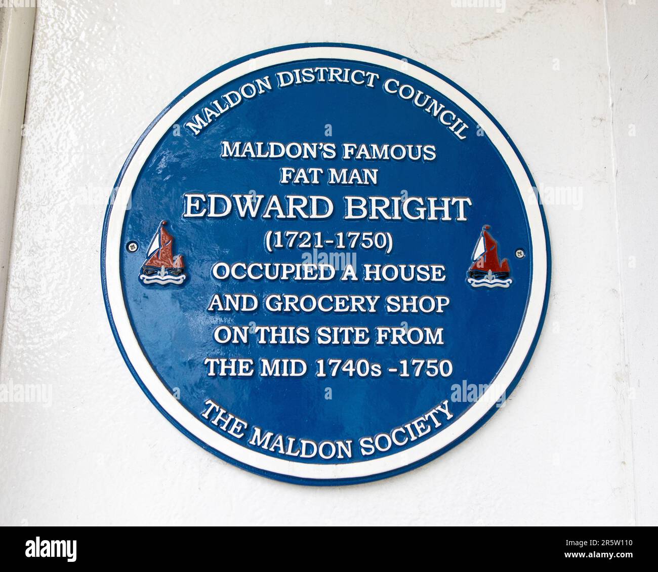 Essex, UK - April 10th 2023: A blue plaque marking the location where famous fat man Edward Bright once lived in Maldon, Essex. Stock Photo