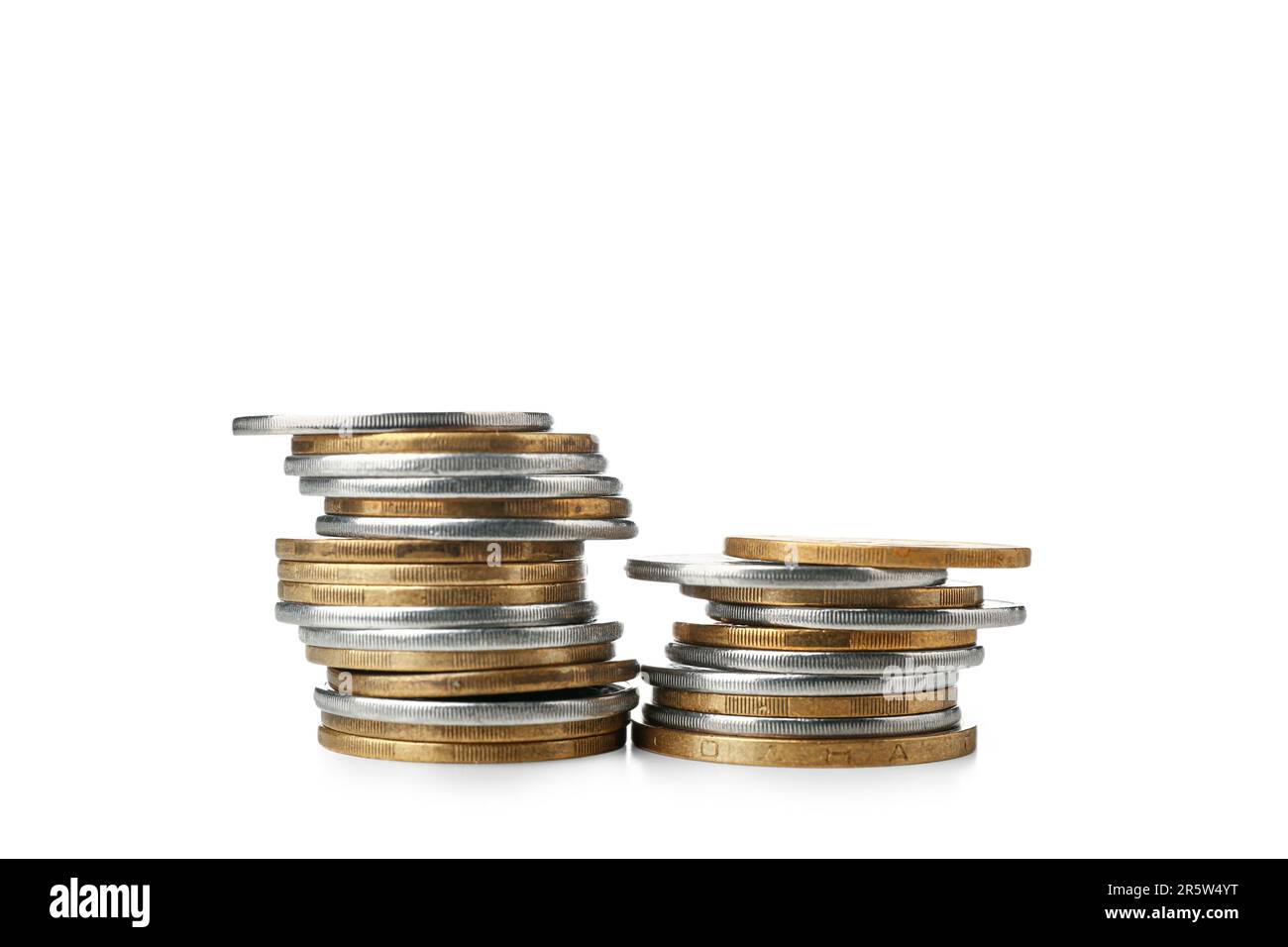 Stacks of coins isolated on white background Stock Photo - Alamy
