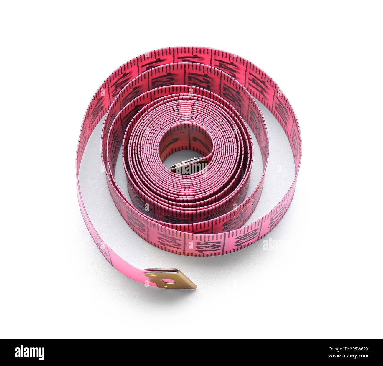 Pink tape measure roll isolated on the white background Stock Photo - Alamy