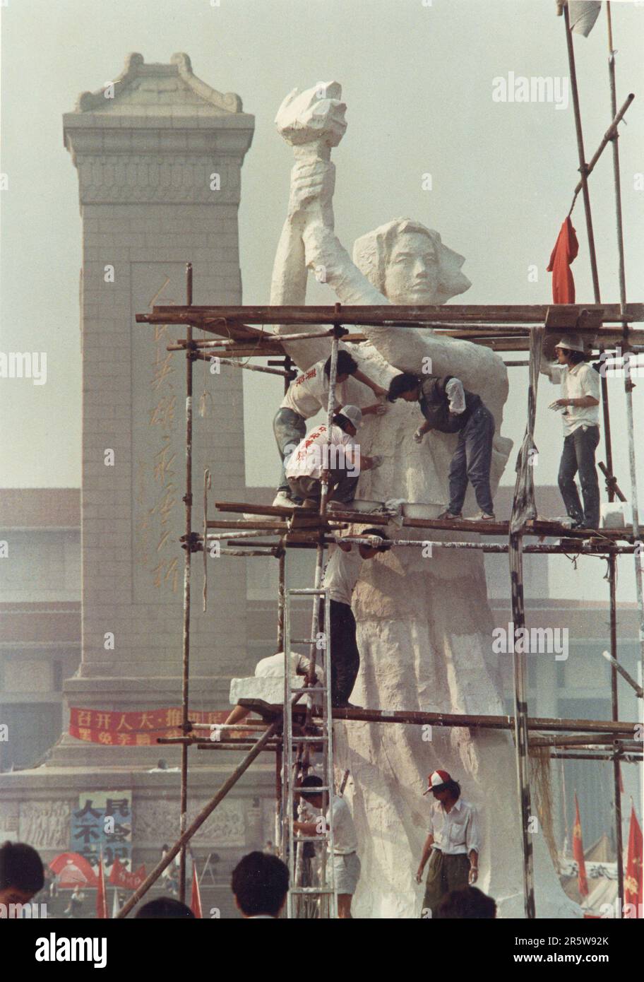 Student artist construct a 'Goddess of Democracy' on Tiananmen Square during protests on May 30, 1989. Stock Photo