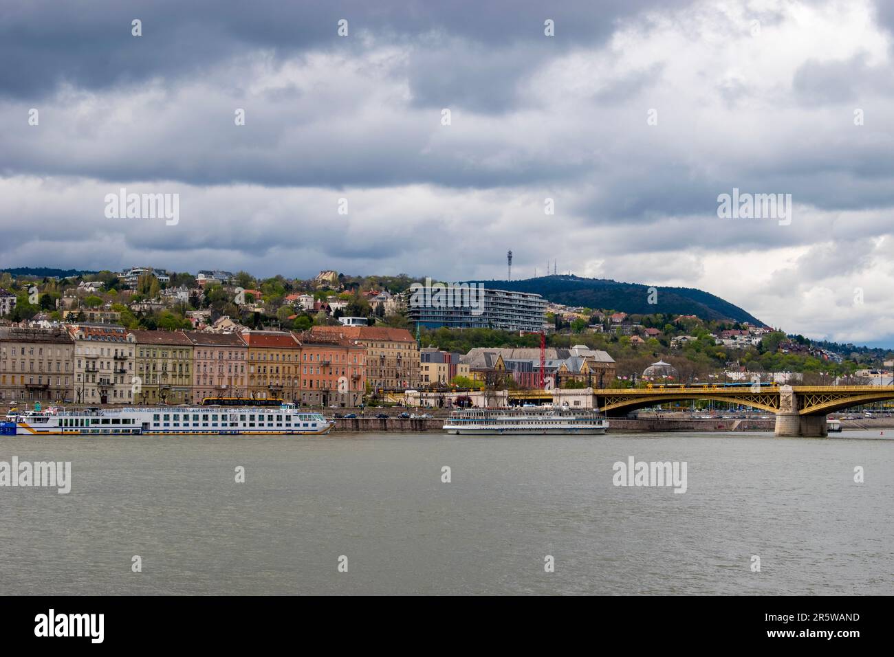 Budapest, Hungary - April 15, 2023 a delightful encounter the danube river, tourist ship, and the joy of exploration Stock Photo