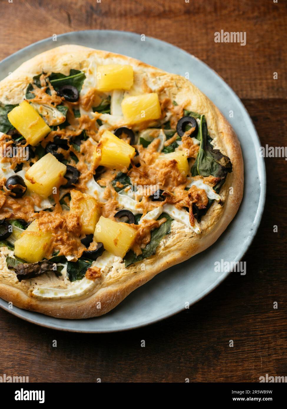 Home made vegan Siberian kale pizza with pineapple and fennel Stock Photo Alamy