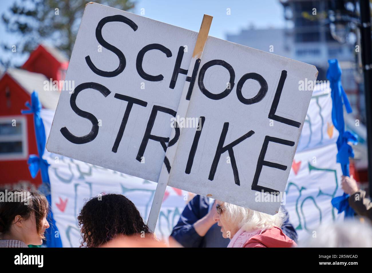 School Strike Sign at Earth Day Rally Stock Photo