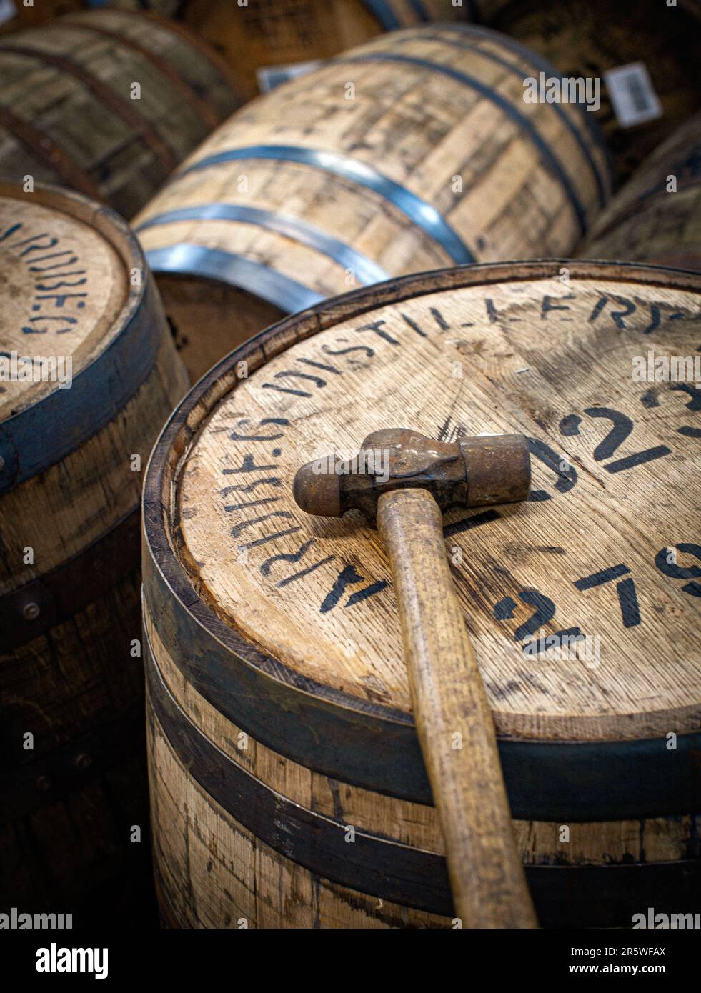 Hammer with whiskey barrel bung at Ardbeg Distillery, Isle of Islay