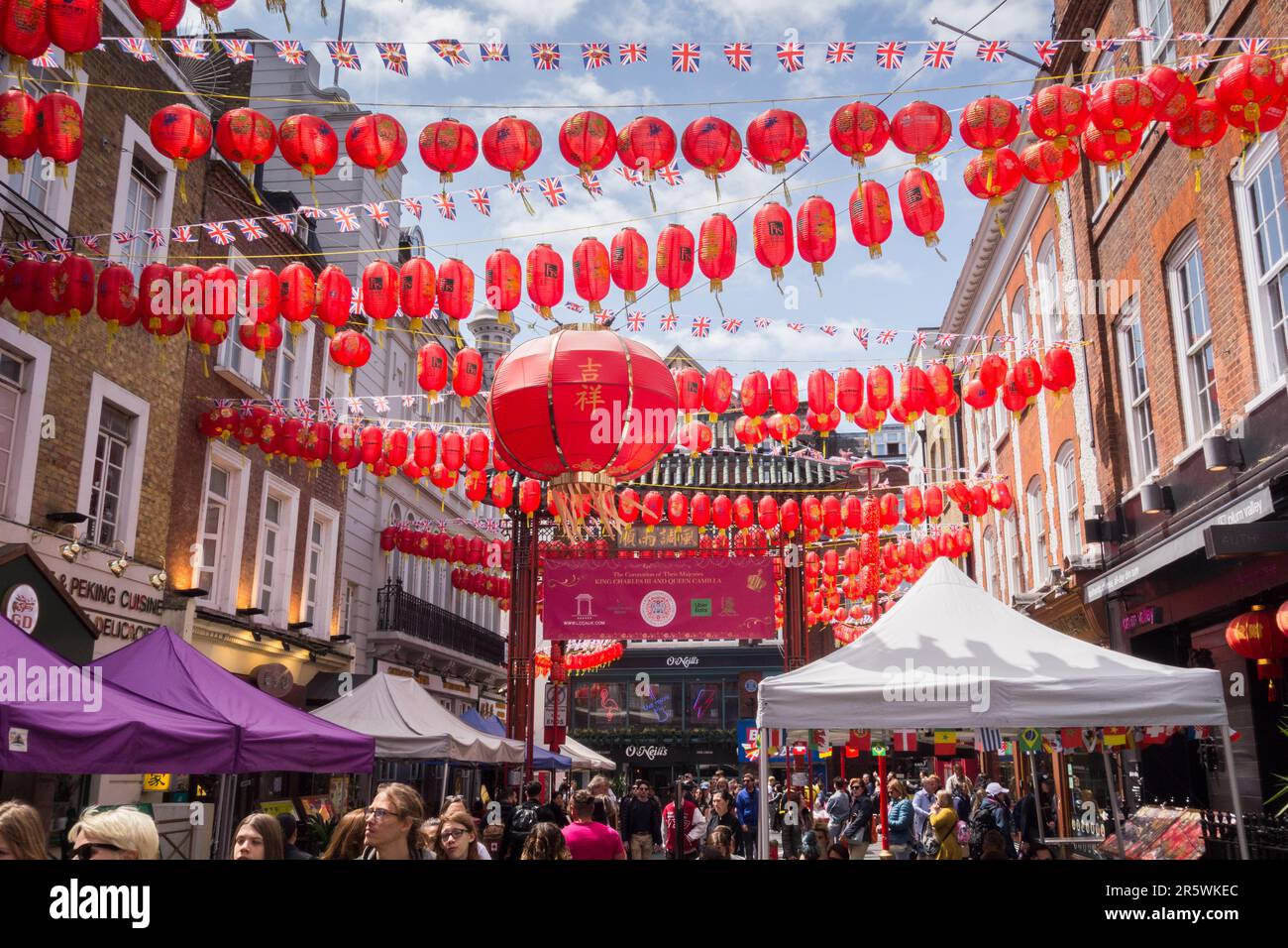 Red paper lanterns on Gerrard Street in Chinatown, Soho, central London, England, U.K. Stock Photo