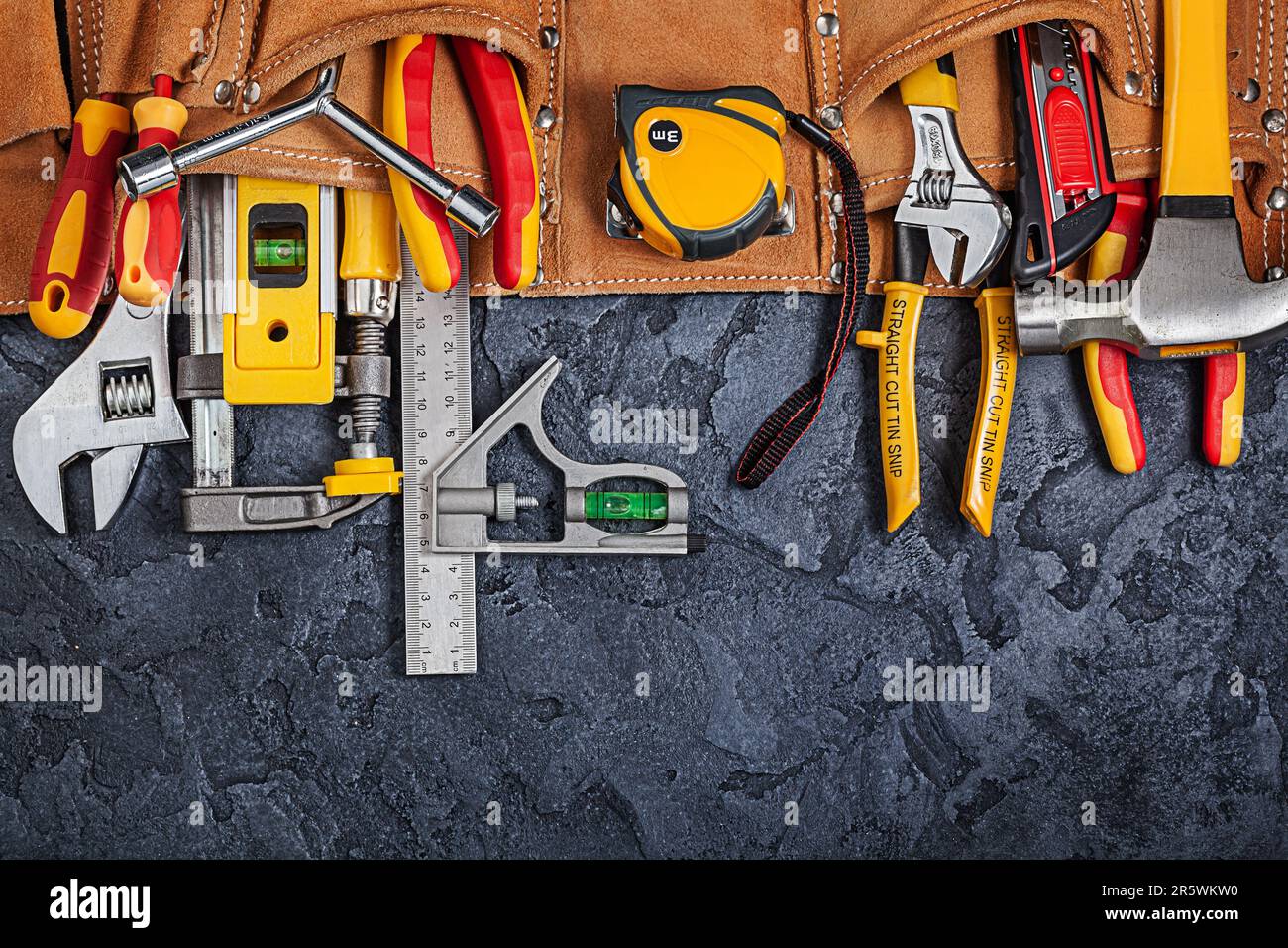 Construction Toolbelt With Different Tools On Black Background Stock Photo