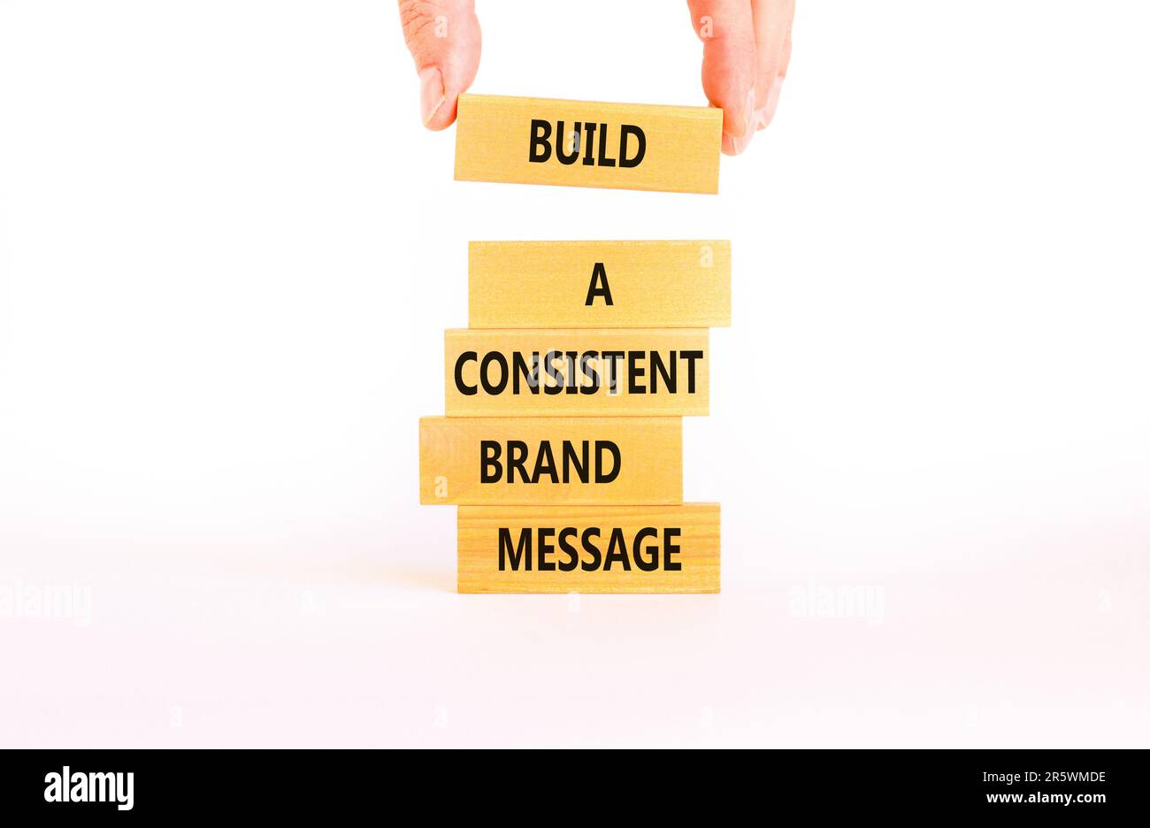 Consistent brand message symbol. Concept words build a consistent brand ...
