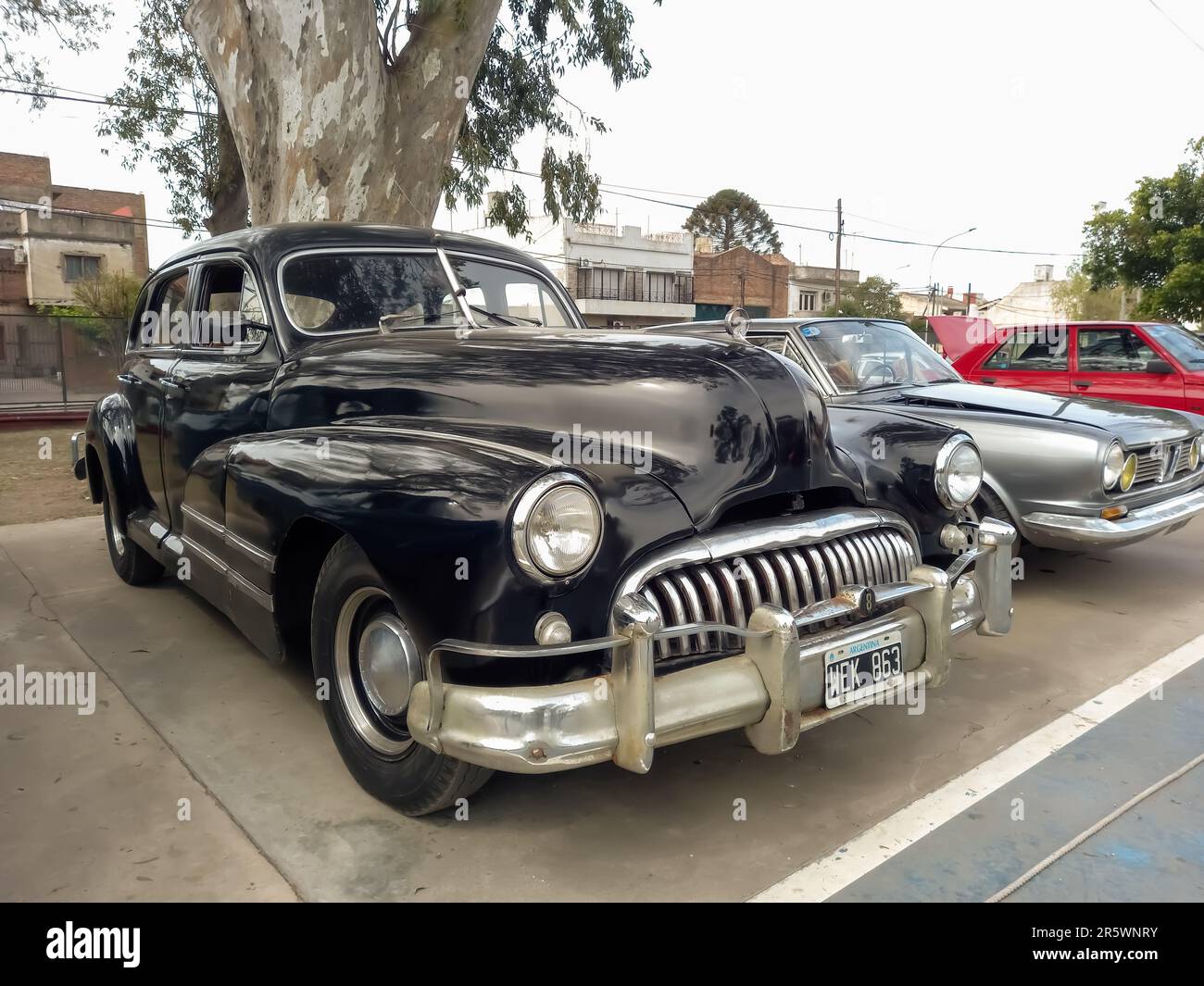 Lanus, Argentina - Sept 25, 2022: Old black 1940s Buick Eight Special four door sedan by GM in a park. AAA 2022 classic car show. Stock Photo