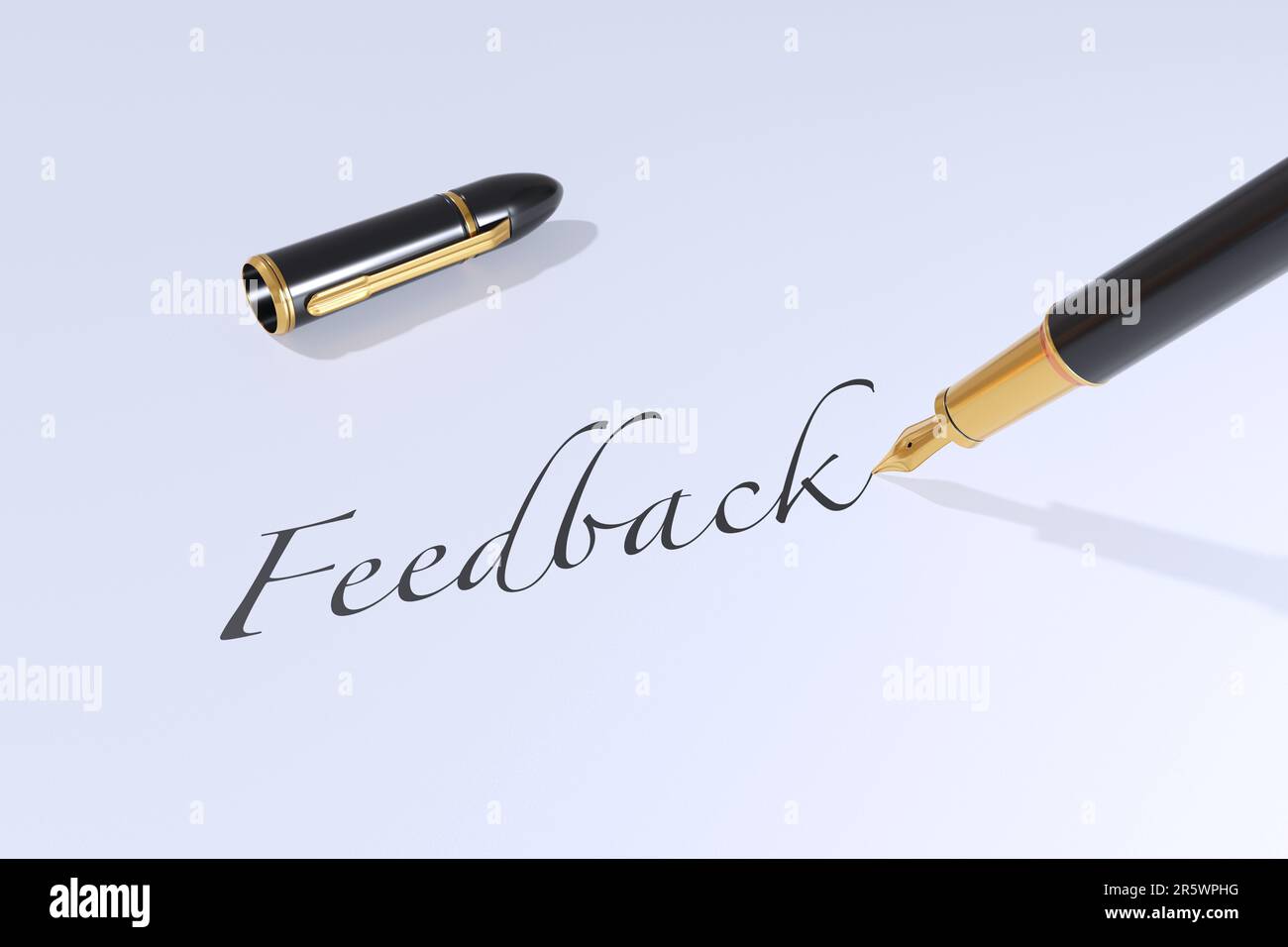 Black fountain pen is being used to write the word Feedback on white