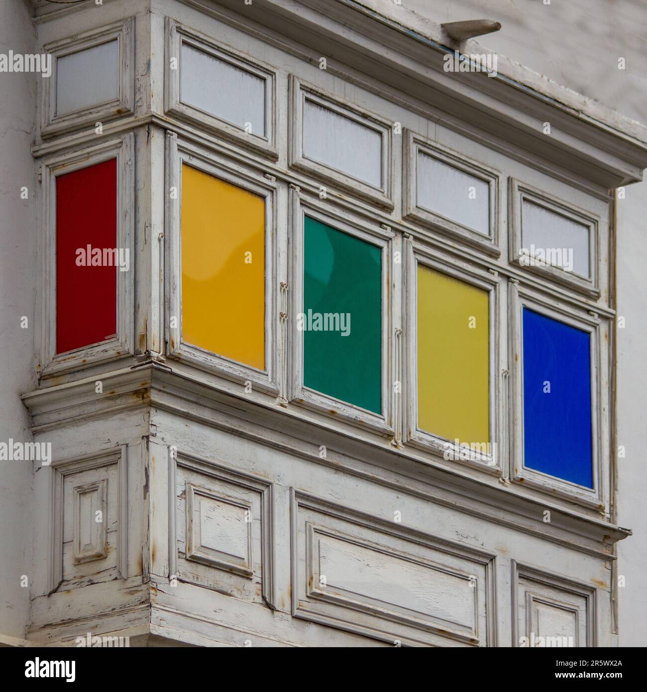 Unique Building Window Patterns A modern building with a unique multi-colored window pattern Stock ...