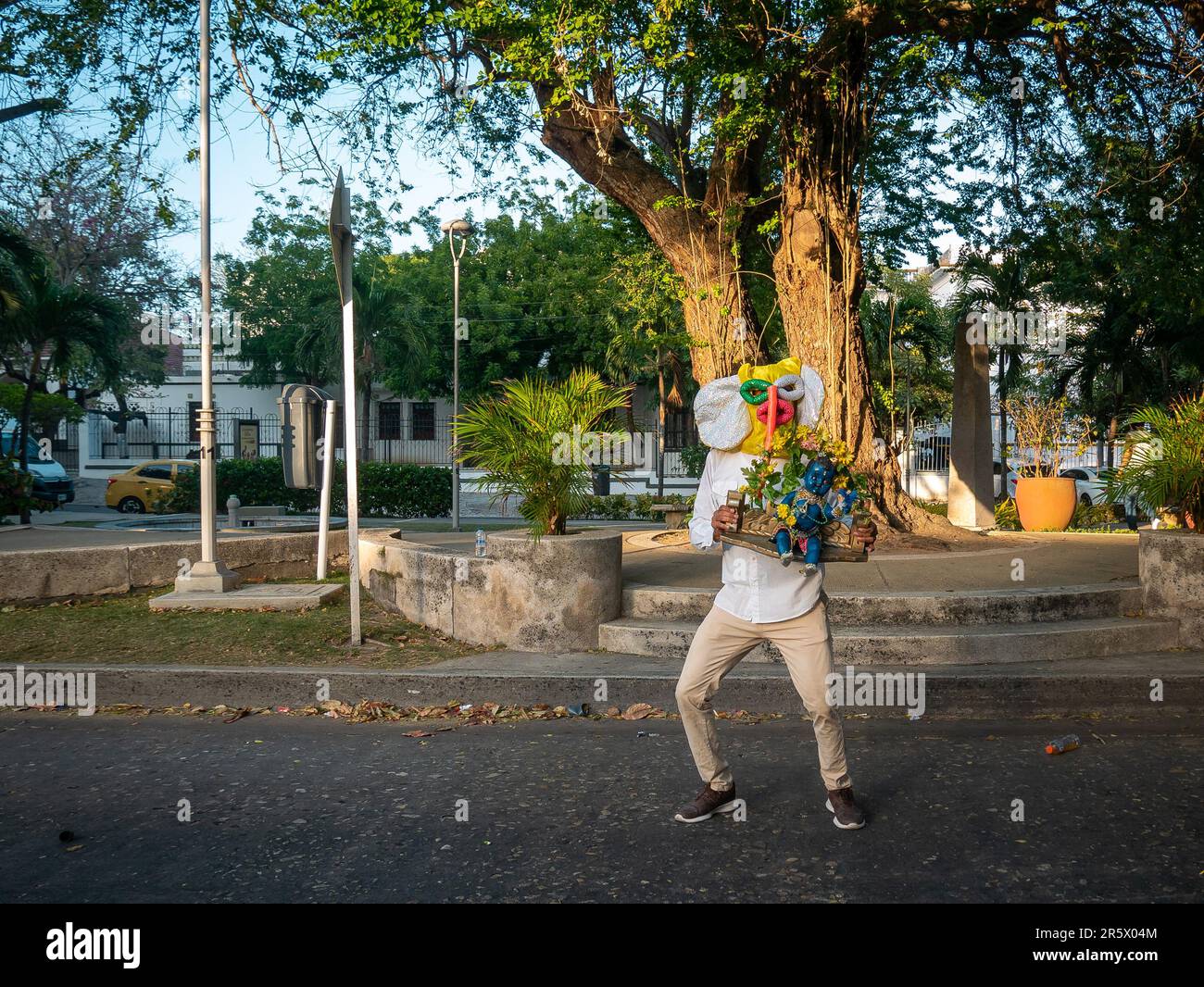 Barranquilla, Atlantico, Colombia - February 21 2023: Colombian Dressed as the Main Character of the Carnival Known as 'Marimonda' Poses in Front of t Stock Photo