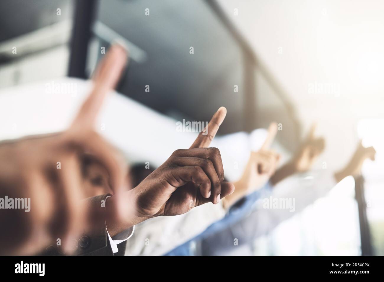 Business people raising hand voting hi-res stock photography and images ...