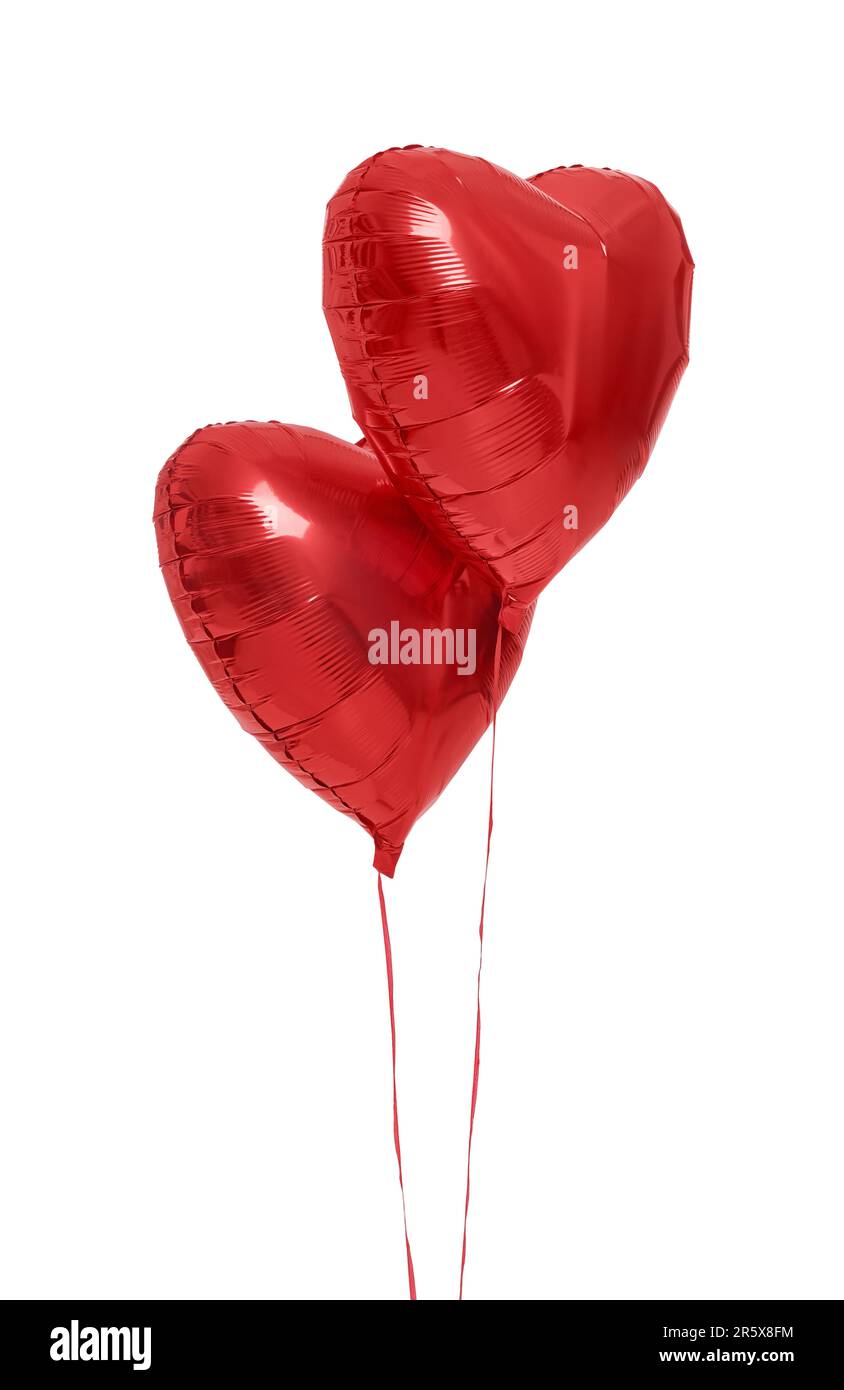 Beautiful red heart shaped balloons isolated on white. Valentine's day ...