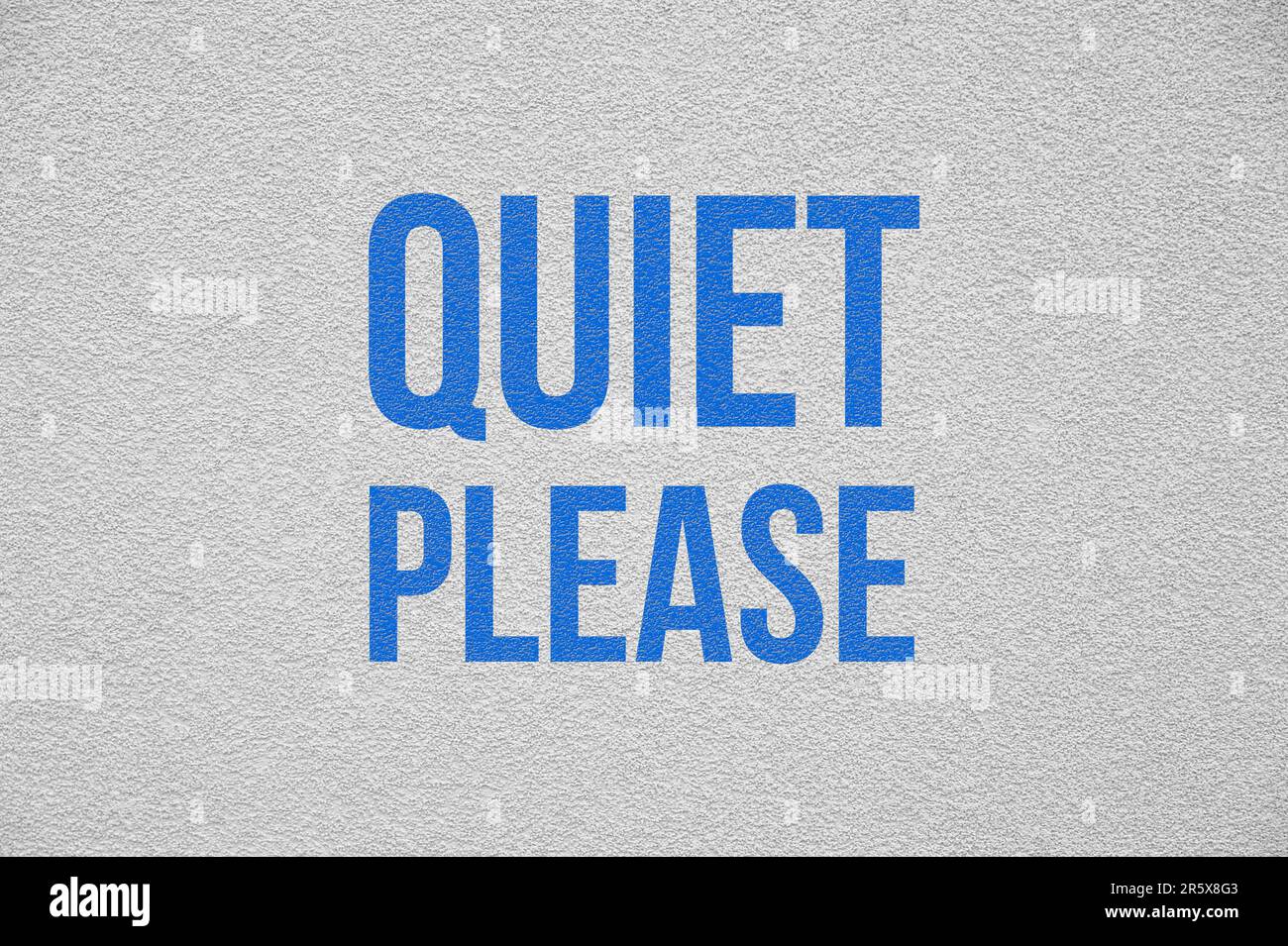Phrase Quiet Please on white textured wall Stock Photo Alamy