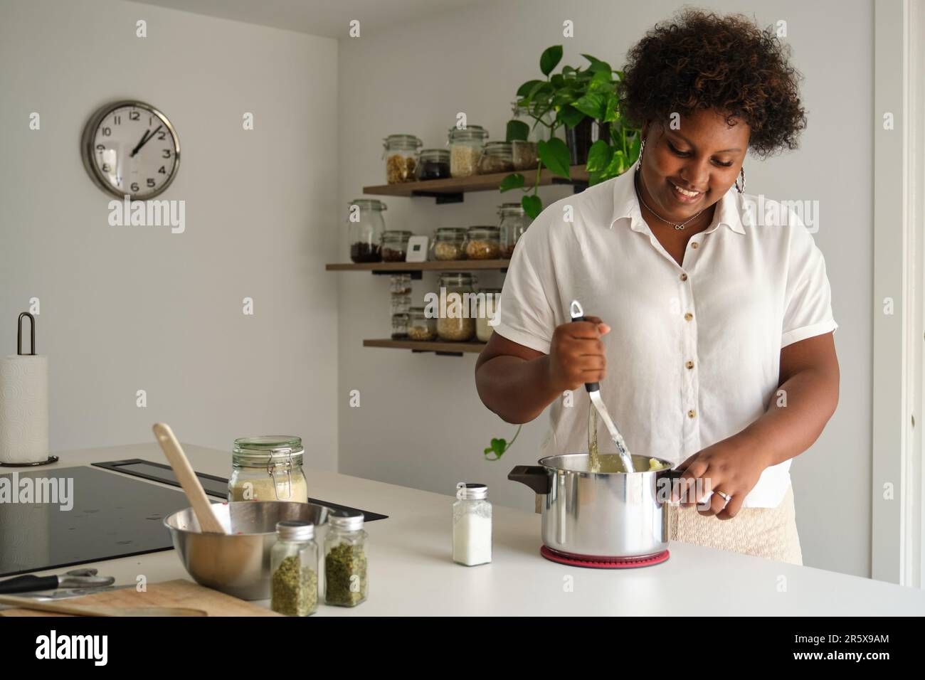 Woman mashing potatoes hires stock photography and images Alamy