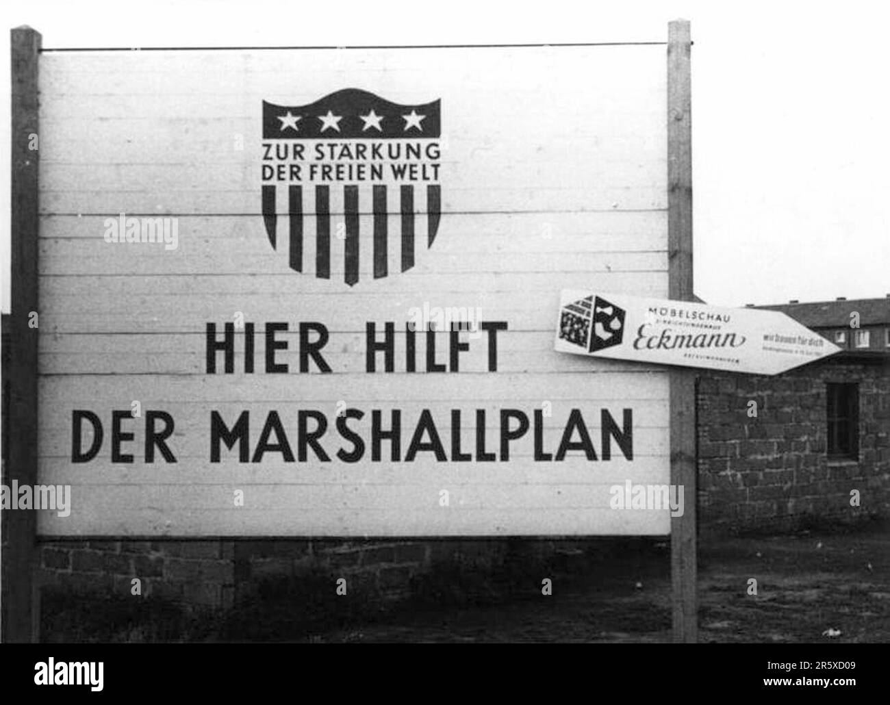 A sign in the Ruhr area of Germany advertising the presnece of The Marshall Plan in rebuilding. The Marshall Plan was a very ambitious financial aid program proposed by US Secretary of State George Marshall. He understood that a destroyed and prostrate Europe had to have financial help if it were to recover and to remove the threat of communist insurgency. The aid was given not lent and each country decided on how it would use the funds. In the three years of the program the US gave Europe $13 billion, a colossal sum worth $175 billion at todays values. This far-seeing and generous plan was a Stock Photo