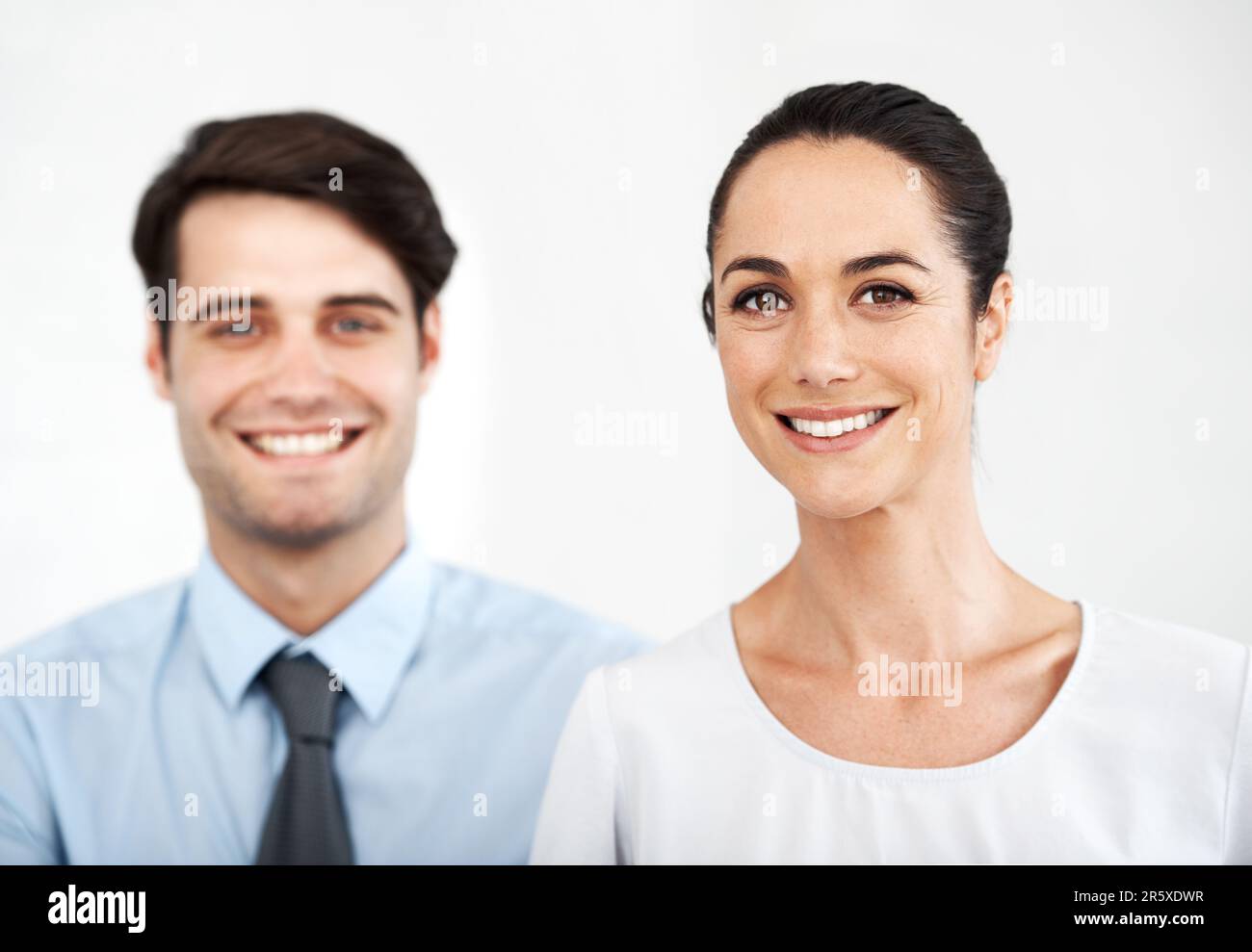 Positive about their careers. Two young business colleagues standing