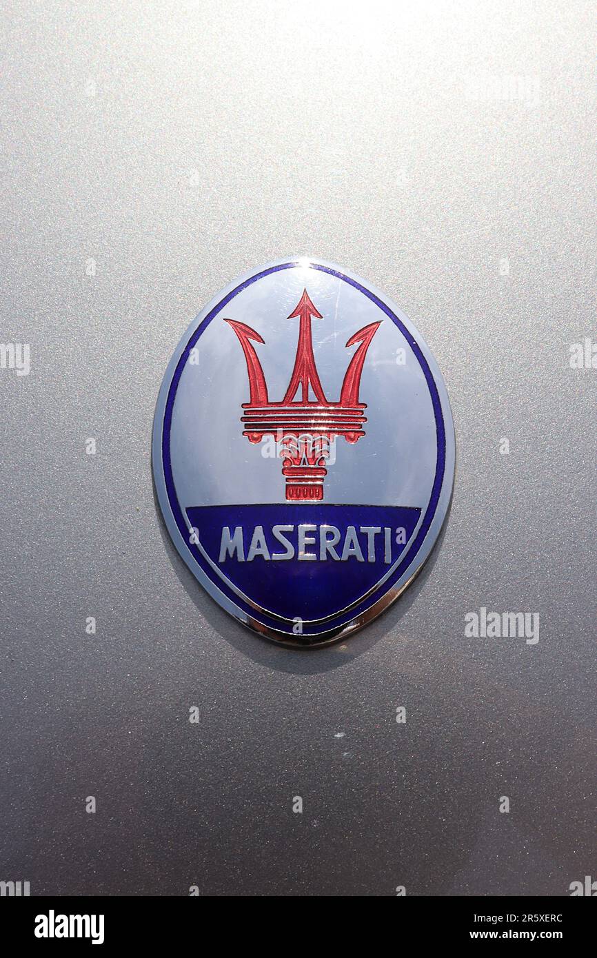 Iconic Maserati Trident emblem on a Maserati 3500 GTi Touring Iniezione, with bodywork by Carrozzeria Touring, May 2023 Stock Photo