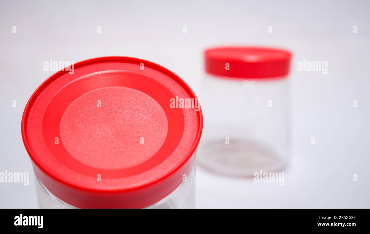 This Clear Jar with Red Lid is a perfect combination of style and